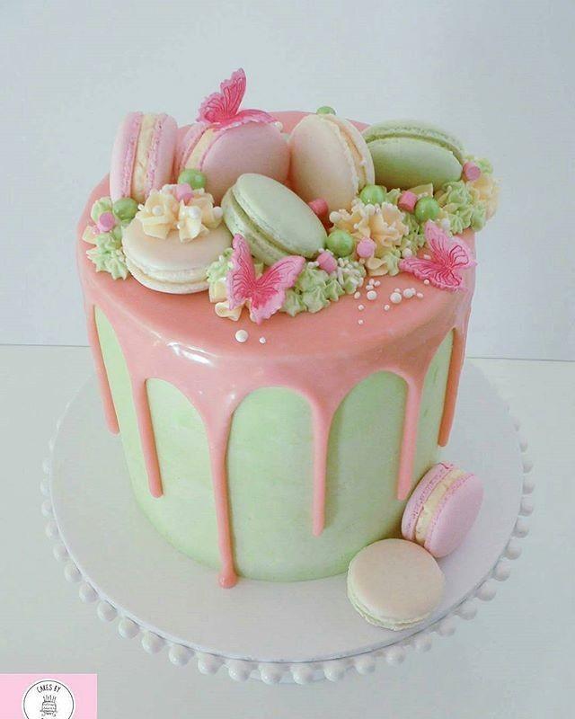 We Love The Combination Of @cakesbysarahwa 's Cake In Green & Pink - Decorated With Butterflies And Macarons!  #dripcake #membershare #macarons #ca… 