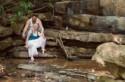 Just a bride and groom chillin in a creek after eloping to Tennessee