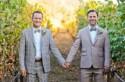 Two grooms steal secret vineyard kisses and dance the hora at their California wedding