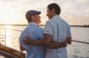 A sunset catamaran ceremony, a travel theme, and two dudes in love