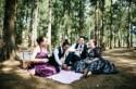 Have a picnic with your crew for totally chill wedding party photos