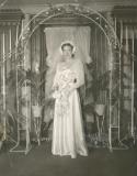 1940's Bride holding a calla lily bouquet.