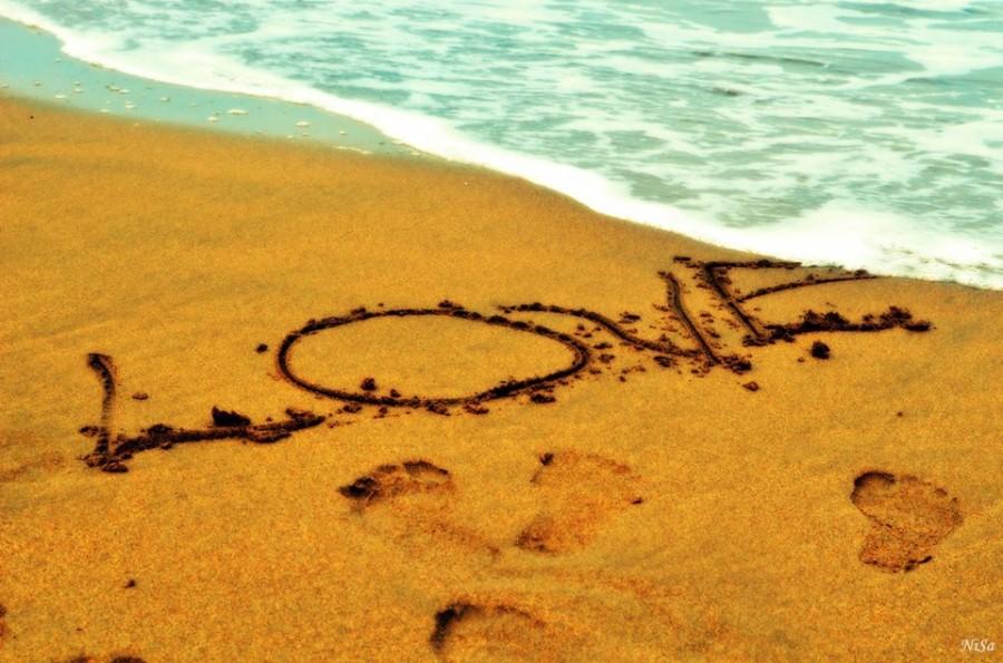 زفاف - Love words on the sand