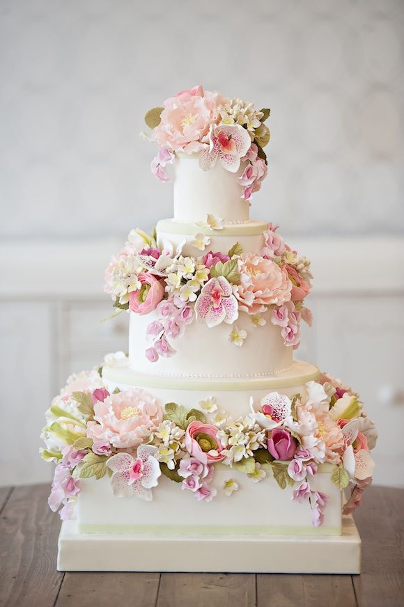 Wedding - Triple tier ivory wedding cake with colorful flowers