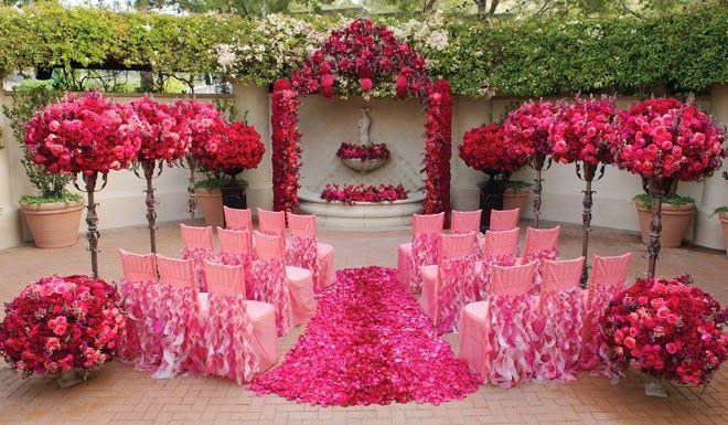 Wedding - Wedding Decor surrounded with red and pink roses.