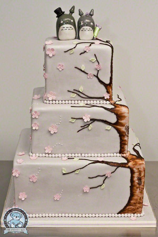 Wedding - Asian/Cherry Blossoms Wedding cake with the couple on the top.