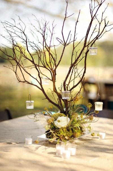 Ideas para decoraciones con ramas para boda 7