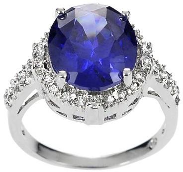 Hochzeit - 4/5 CT. T.W. Oval Cut Tanzanite and Round Cut CZ Pave Set Bridal Style Ring in Sterling Silver - Silver