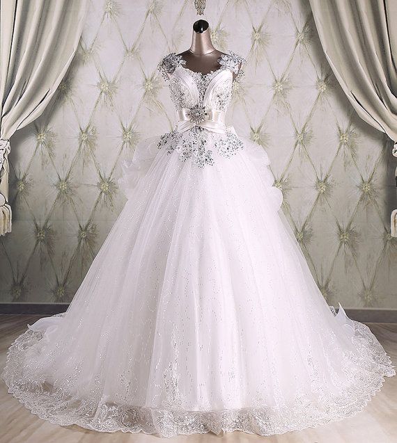 Mariage - Real Sample High Quality Ball Gown Sequins Luxury Wedding Gown With Long Train 2015/Bridal Dresses