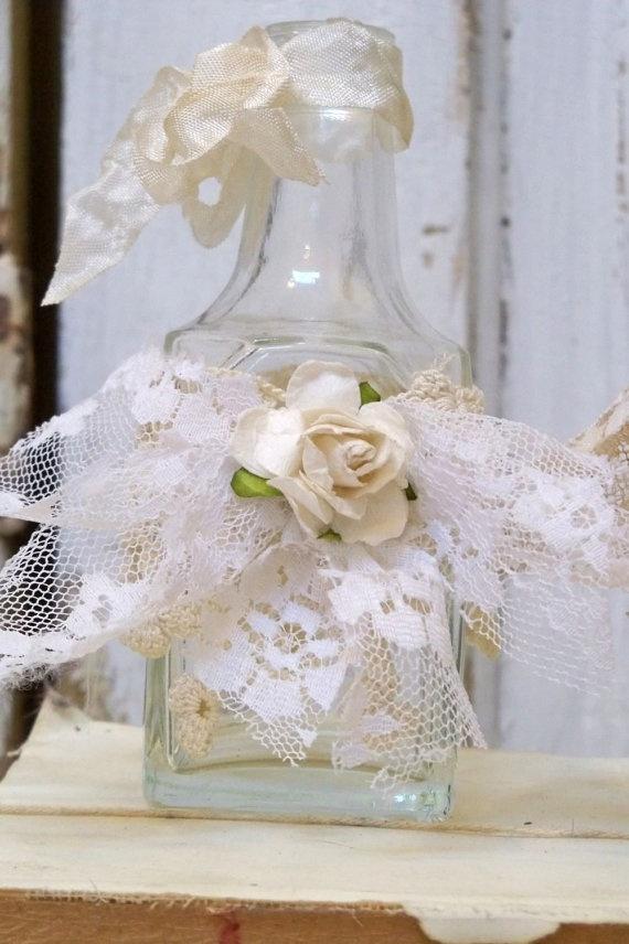 Mariage - Shabby Chic Lace Bottles Recycled Shelf Stuffers With Salvaged Lace Tea Stained Paper Roses Table Decor Anita Spero