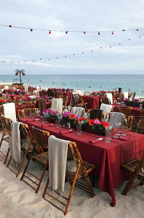 Wedding - Sand-colored Linens And Crisp Blue Place Settings Echo The Colors Of The Beach And The Sea.