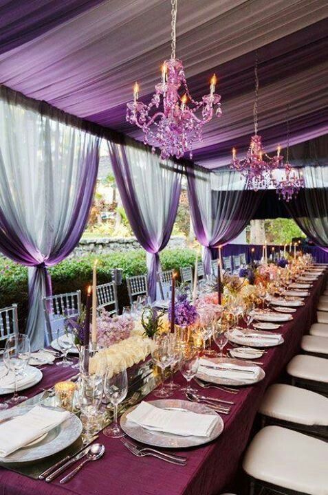 Mariage - Elegant Purple Chandeliers Are Suspended Above Each Long Table.