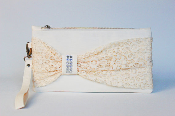 Hochzeit - PROMOTIONAL SALE - Ivory Bow wristelt  lace clutch,bridesmaid gift ,wedding gift ,make up bag,zipper pouch,cosmetic bag, ivory