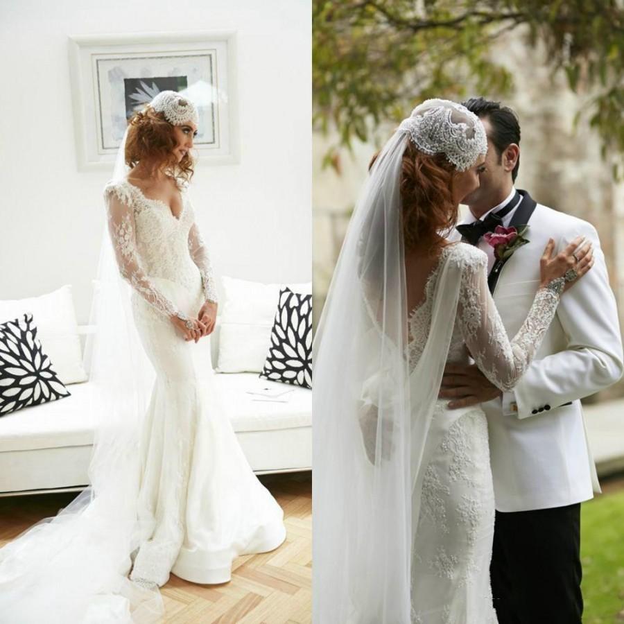 Mariage - 2015 Spring Lace Wedding Dresses White Backless V Neck Long Sleeve Applique Sweep Train Sheer Garden Mermaid Wedding Gown Dress For Bridal Online with $117.72/Piece on Hjklp88's Store 