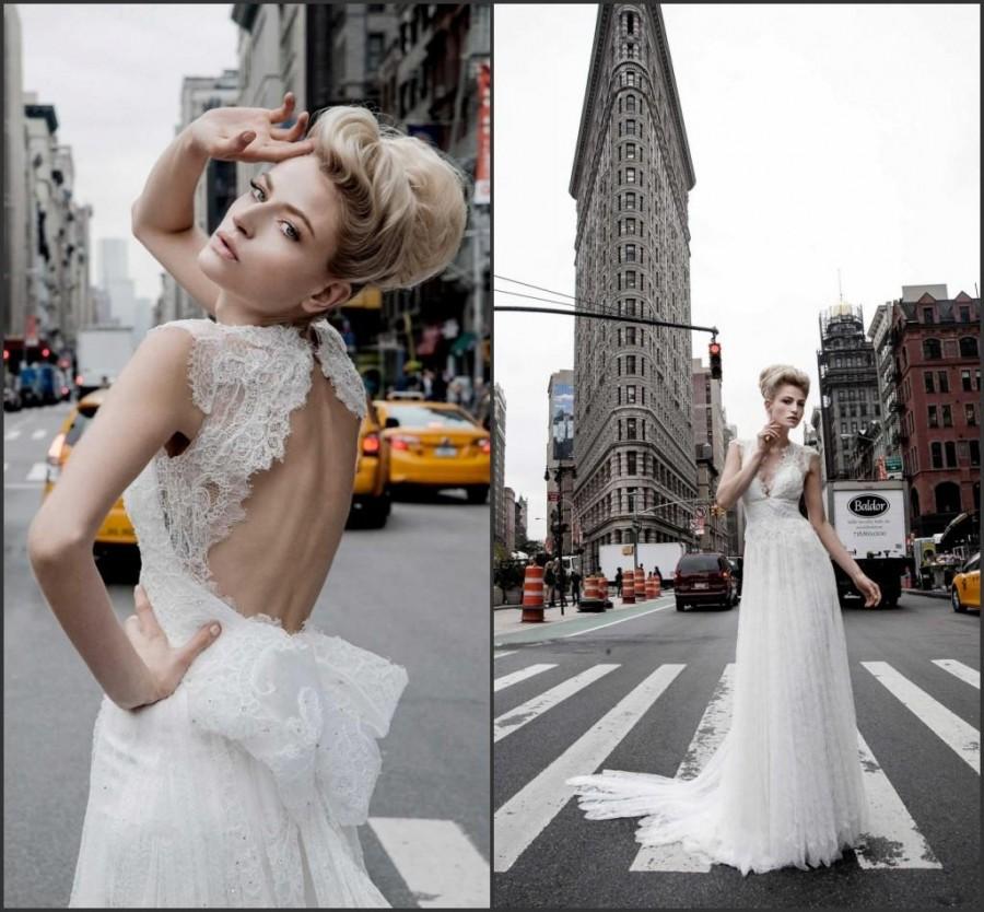 Mariage - 2015 Newest Pnina Tornai Beach Spring Wedding Dresses V-Neck See Through Wedding Ball Backless Appliques Tulle Lace Sequins Bridal Gowns, $117.72 