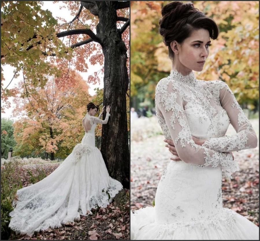 Hochzeit - Winter Long Sleeve Hollow Beads Lace Wedding Dresses High Neck Pnina Tornai Mermaid Fall 2015 Bridal Gowns Dresses Applique Illusion, $120.14 