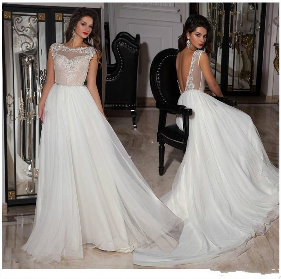 Свадьба - Charming Applique Wedding Dresses 2015 Sheer Neck Backless Beaded Crystal Flowing Tulle A-line Bridal Dress Ball Gowns Sweep Train Beach Online with $112.08/Piece on Hjklp88's Store 