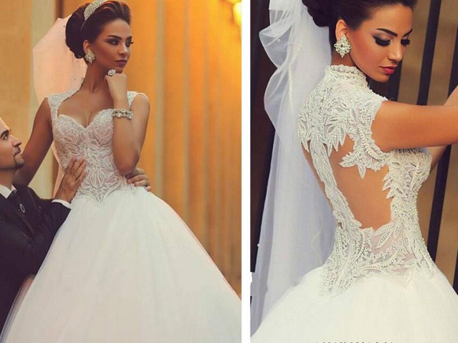 Mariage - Exquisite A-Line Wedding Dresses Tulle Ball Gowns Sleeveless Beaded Sweetheart Neck Chapel Train Real Image Bridal Dress Custom Spring Online with $136.18/Piece on Hjklp88's Store 