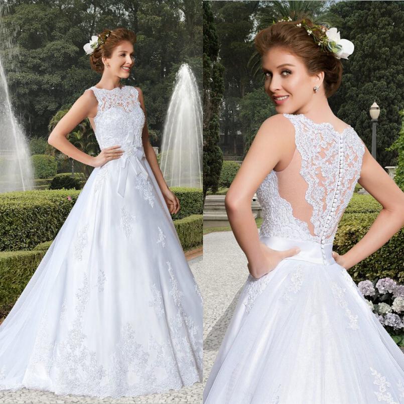 Mariage - 2015 New Arrival Vestidos De Noiva Sexy Illusion Jewel Neck A-Line Wedding Dresses Beaded Vintage Applique Button Tulle Bridal Gowns Online with $112.82/Piece on Hjklp88's Store 