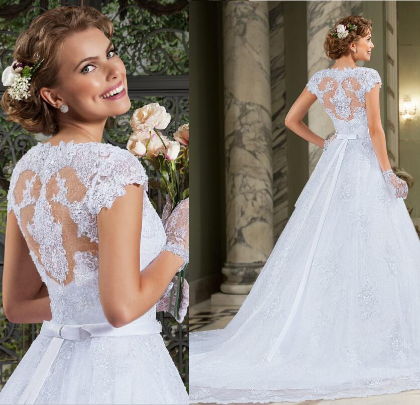 Hochzeit - New Arrival Vestidos De Noiva Sexy V Neck A-Line Capped Wedding Dresses Beaded Sequins Bow Vintage Applique Tulle Garden Bridal Gowns Online with $112.82/Piece on Hjklp88's Store 