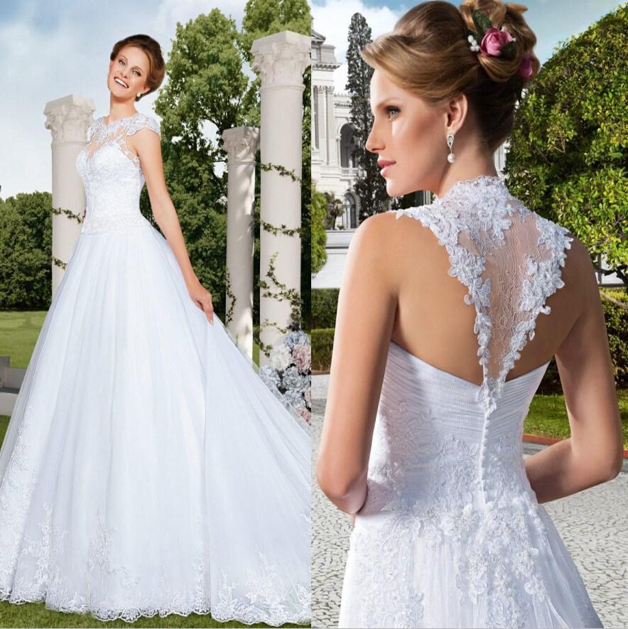 Mariage - New Arrival Vestidos De Noiva Sexy Illusion Jewel Neck A-Line Wedding Dresses Beaded Vintage Applique Tulle Garden Bridal Gowns Chapel Train Online with $112.82/Piece on Hjklp88's Store 