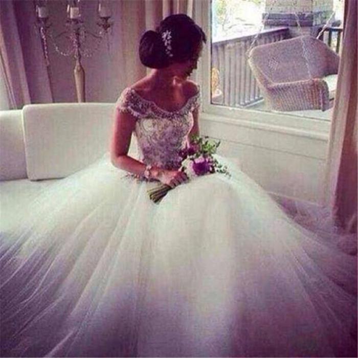 Mariage - 2015 Sheer A Line Wedding Dresses V Neck Cap Sleeves Vestido De Novia Tulle Chapel Length Sequined Beads Lace Organza Bridal Gowns Ball Online with $117.72/Piece on Hjklp88's Store 