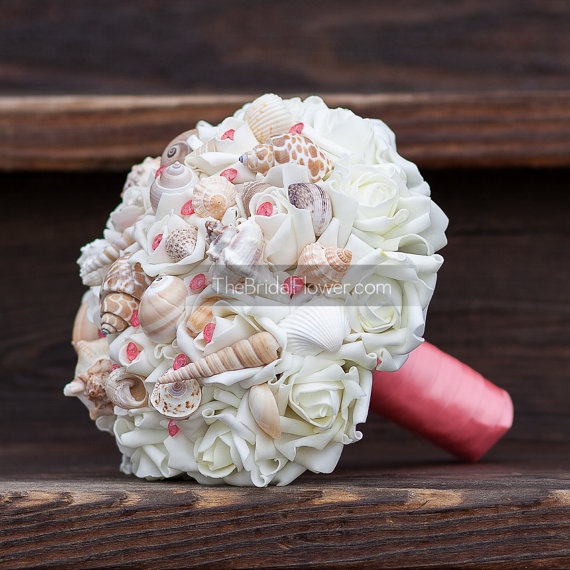 Hochzeit - Coral seashell bouquet with cream roses and coral ribbon and pins for beach and destination wedding