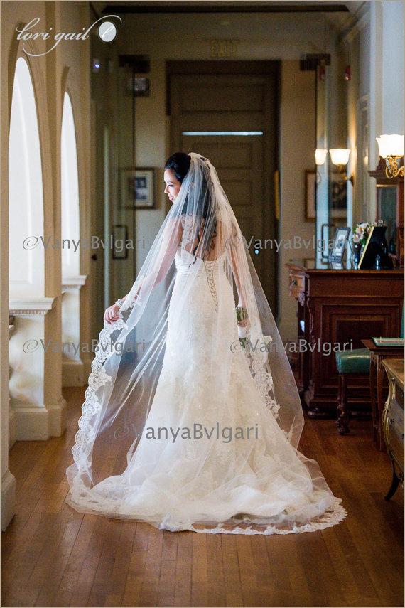 Wedding - Cathedral wedding veil with beaded re-embroidered  lace on the edge starting at elbow level with gathered top on a hair comb, classic veil