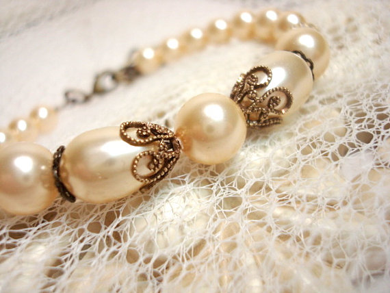 Hochzeit - Bridal bracelet, pearl bracelet with Swarovski light gold pearls and Swarovski champagne crystals, vintage style, wedding bracelet