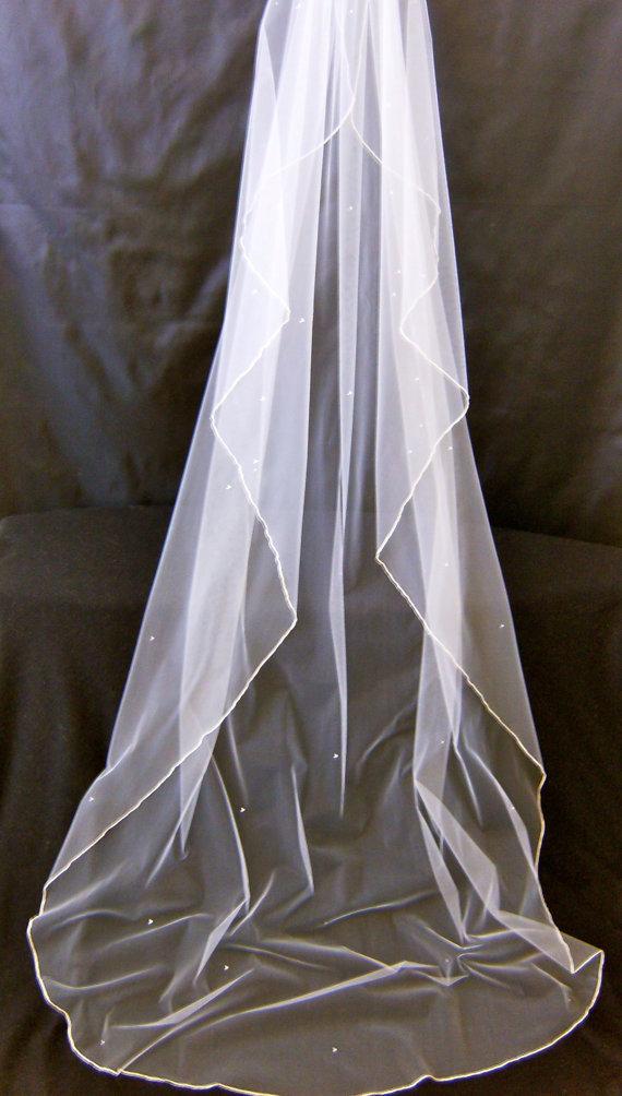 Lucinda A Swarovski Crystal Rhinestone Silk Pencil Edge 90 Inch Lucinda A Swarovski Crystal Rhinestone Silk Pencil Edge 90 Inch Long Cascading Chapel Length Veil