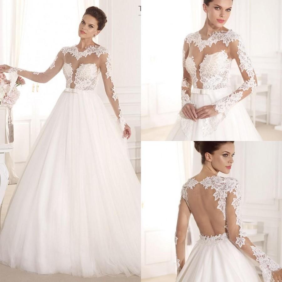 Hochzeit - Tarik Ediz White Wedding Dresses 2015 Sexy Sheer Scoop Long Sleeve Backless A Line Chapel Train Applique Lace Tulle Gown Bridal Ball Online with $133.51/Piece on Hjklp88's Store 