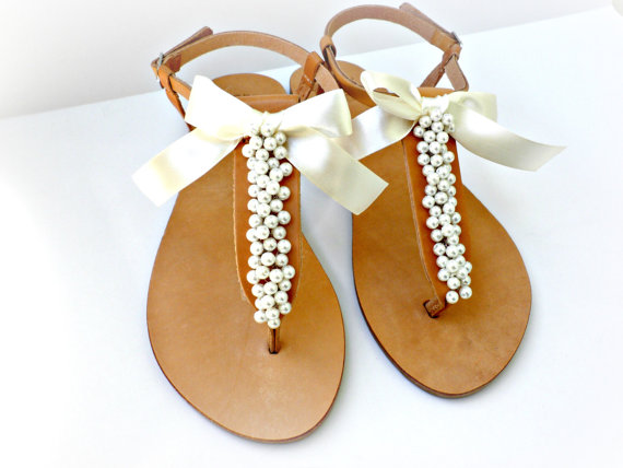 Свадьба - Wedding sandals- Greek leather sandals decorated with ivory pearls and satin bow -Bridal party shoes- Ivory women flats- Bridesmaid sandals