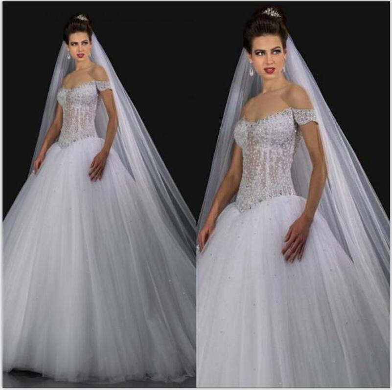 Mariage - Sexy See Through 2015 Ball Gown Wedding Dresses with Beaded Off Shoulder Cap Sleeve Crystal Tulle Chapel Train Church Bridal Ball Gowns Online with $137.96/Piece on Hjklp88's Store 
