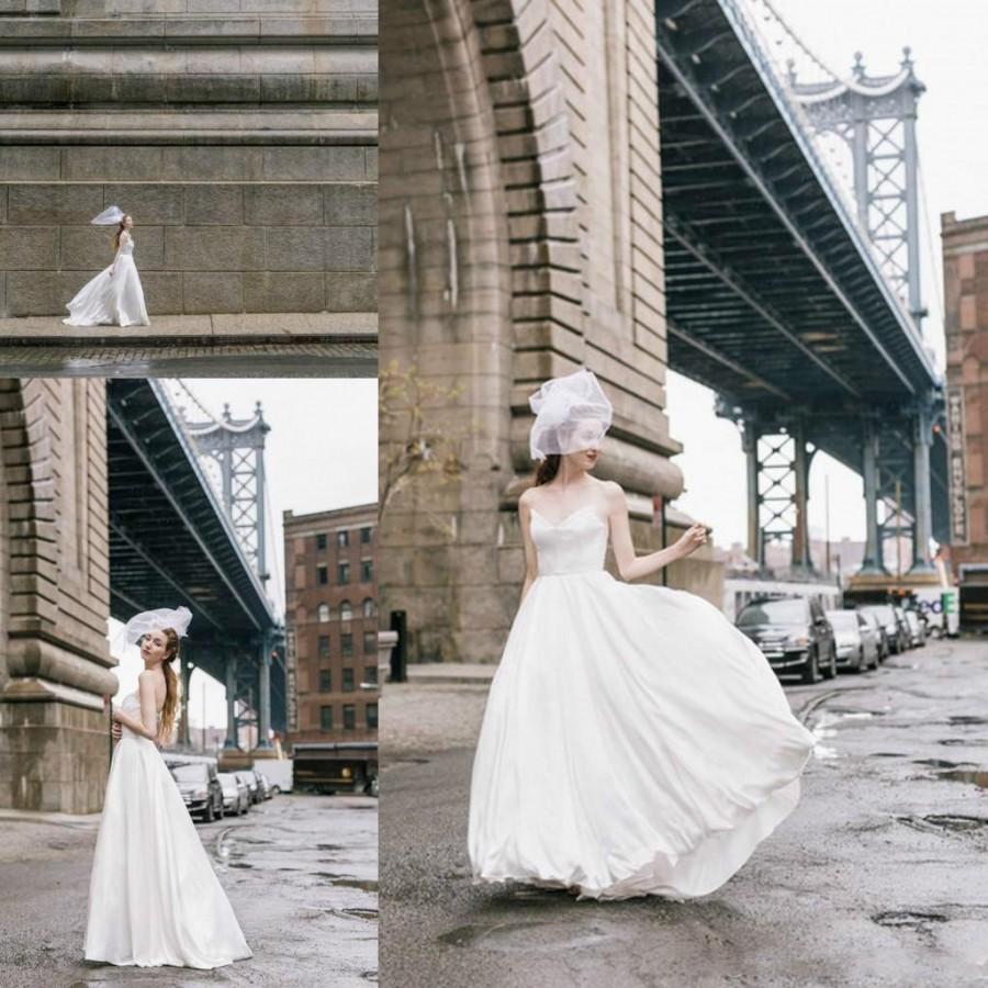 زفاف - 2016 Spring Lakum Spaghetti Straps Wedding Dresses Open Back Flowing Satin Skirt Sweep Train Beach Bridal Ball Gowns Cheap Plus Size Custom Online with $123.72/Piece on Hjklp88's Store 