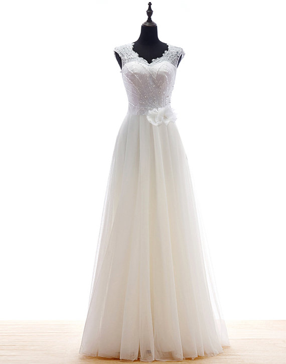 Wedding - Custom made Feminine Lace Wedding Dress with Deep V-Neckline ,hand beaded and Flower Sash detail ,floor Length Chiffon and tulle Skirt