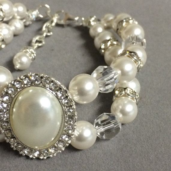 Hochzeit - Swarovski Bridal Bracelet.  White Swarovski Pearls with Crystal and Pearl Oval Accent 