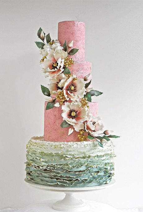 Wedding - A Four-Tiered Cake With Cascading Flowers