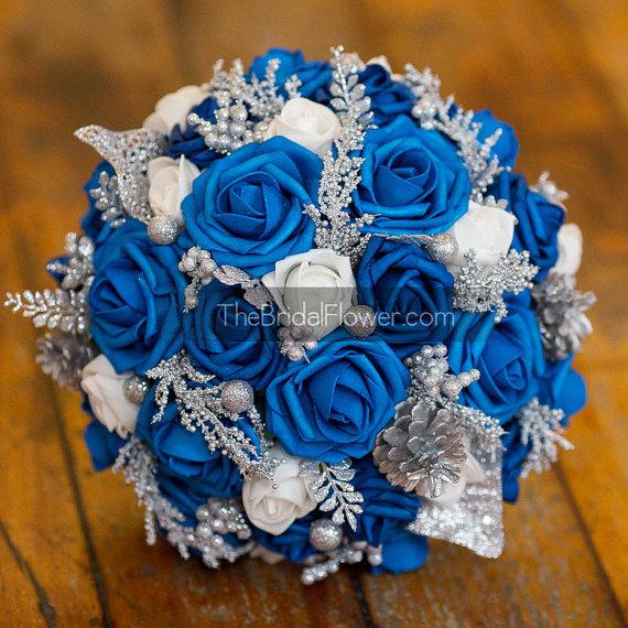 Wedding - Winter wonderland royal blue silver and white bouquet with realistic roses, white rosebuds pine cones and pearls
