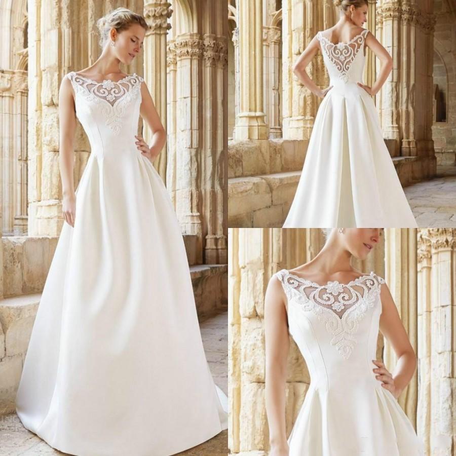 Mariage - New Arrival 2015 A Line Wedding Dresses Sheer Neck Scoop Sleeveless Sweep Train Garden Applique with Stain Hollow Bridal Dress Ball Gowns Online with $127.73/Piece on Hjklp88's Store 
