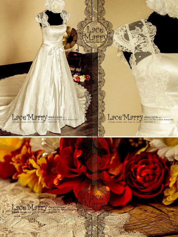 زفاف - Vintage Inspired Lace Wedding Dress Features Cap Sleeves Full Lace Covered Back and Ribbon on the Waistline