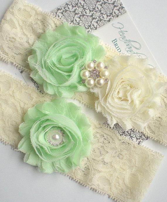 Свадьба - Beautiful MINT GREEN Bridal Garter Set - Ivory Keepsake & Toss Wedding Garters - Chiffon Frayed Flowers Rhinestone Garters Ivory Spring