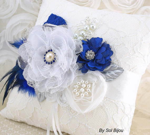 Hochzeit - Bridal Ring Bearer Pillow with in White, Silver and Royal Blue with Lace, Pearls, Feathers and Handmade Flowers