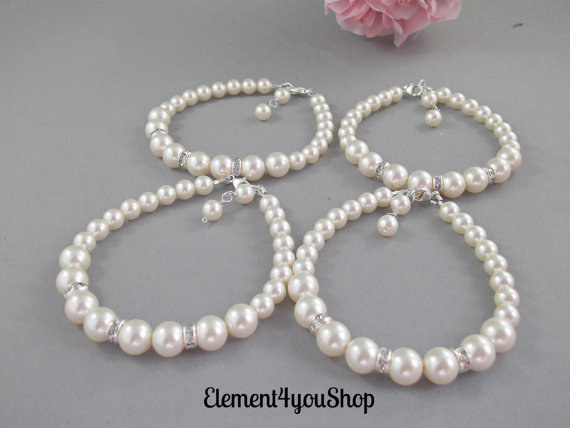 Hochzeit - Wedding bracelets Set of 4 bridesmaid jewelry, Swarovski ivory blue purple pearls, Simple beaded bracelet, Single strand pearl bracelet