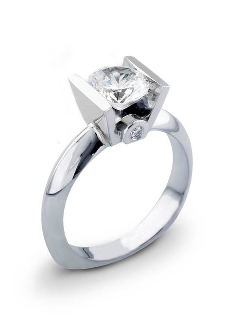 زفاف - Ladies 14kt white gold modern engagement ring solitaire with 1.50ct Round Brilliant white sapphire and 0.06 carats G-VS2 diamonds