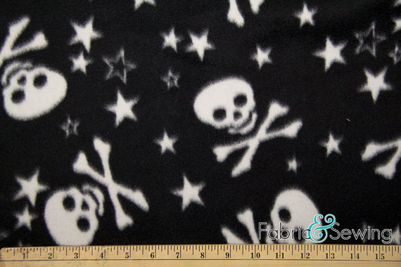 Hochzeit - Starry Skulls & Bones White Anti-Pill Polar Fleece Fabric Polyester 13 Oz 58-60"
