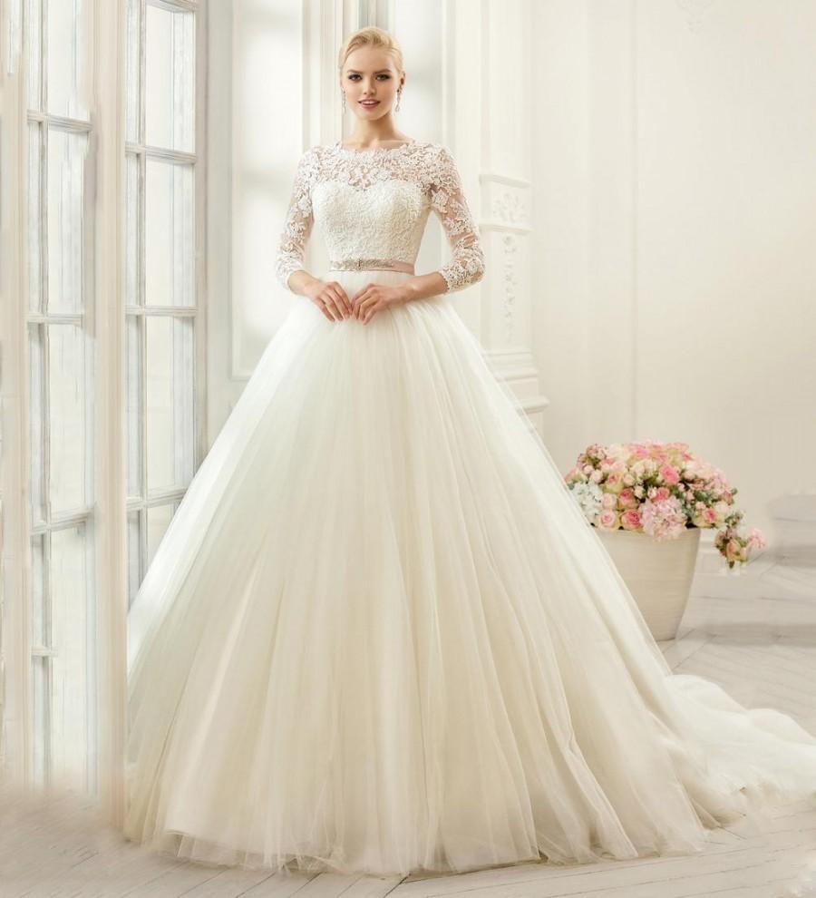 Mariage - Princess 2016 Wedding Dresses Scoop Tulle Sheer 3/4 Long Sleeve Illusion Lace Applique Bridal Ball Gowns Chapel Train Dresses Wedding Style Online with $125.5/Piece on Hjklp88's Store 