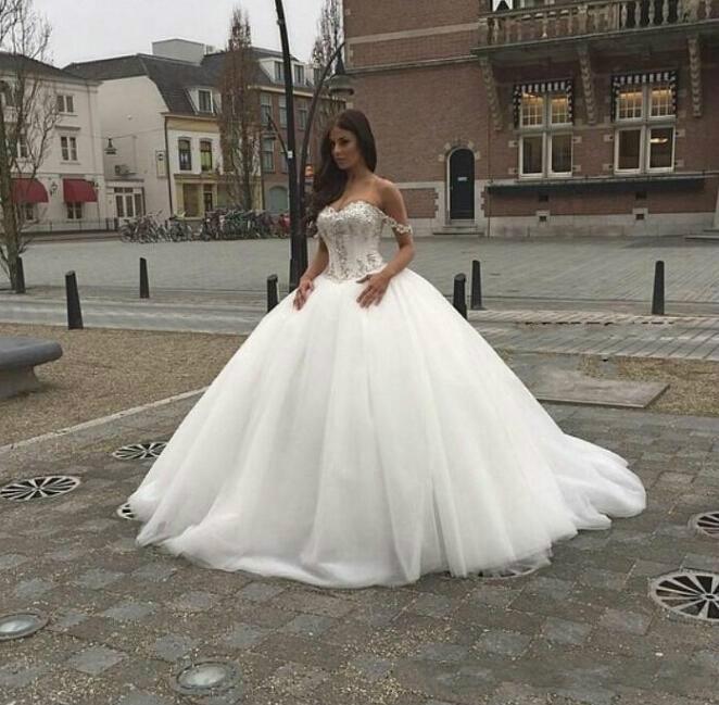 Свадьба - Charming Church Beads 2016 Wedding Dresses Off The Shoulder Tulle Applique A-Line Bridal Ball Gowns Dresses Wedding Style Chapel Train Online with $126.39/Piece on Hjklp88's Store 
