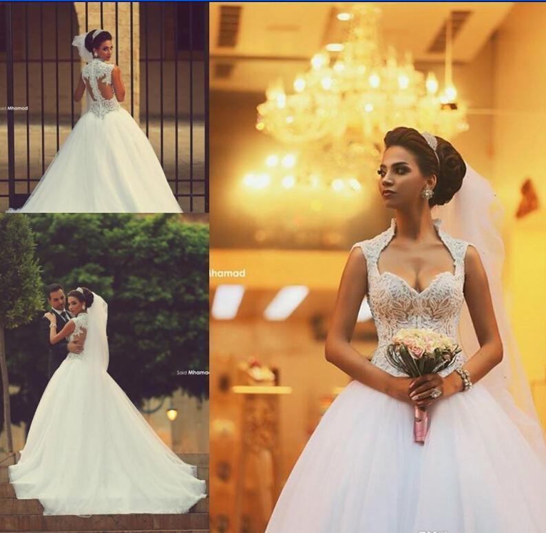 Mariage - 2015 Sweetheart Saudi Arabic Backless Winter Wedding Dresses Zipper Back Appliques Beaded Bodice Sheer Ball Gown Organza Bridal Gowns Online with $142.41/Piece on Hjklp88's Store 