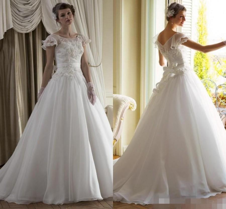 Hochzeit - New Collection Vintage Wedding Dresses 2015 Cap Sleeve Organza Sash Spring A-Line Bridal Ball Dress Gowns Lace Cheap Sheer Chapel Train Online with $126.39/Piece on Hjklp88's Store 