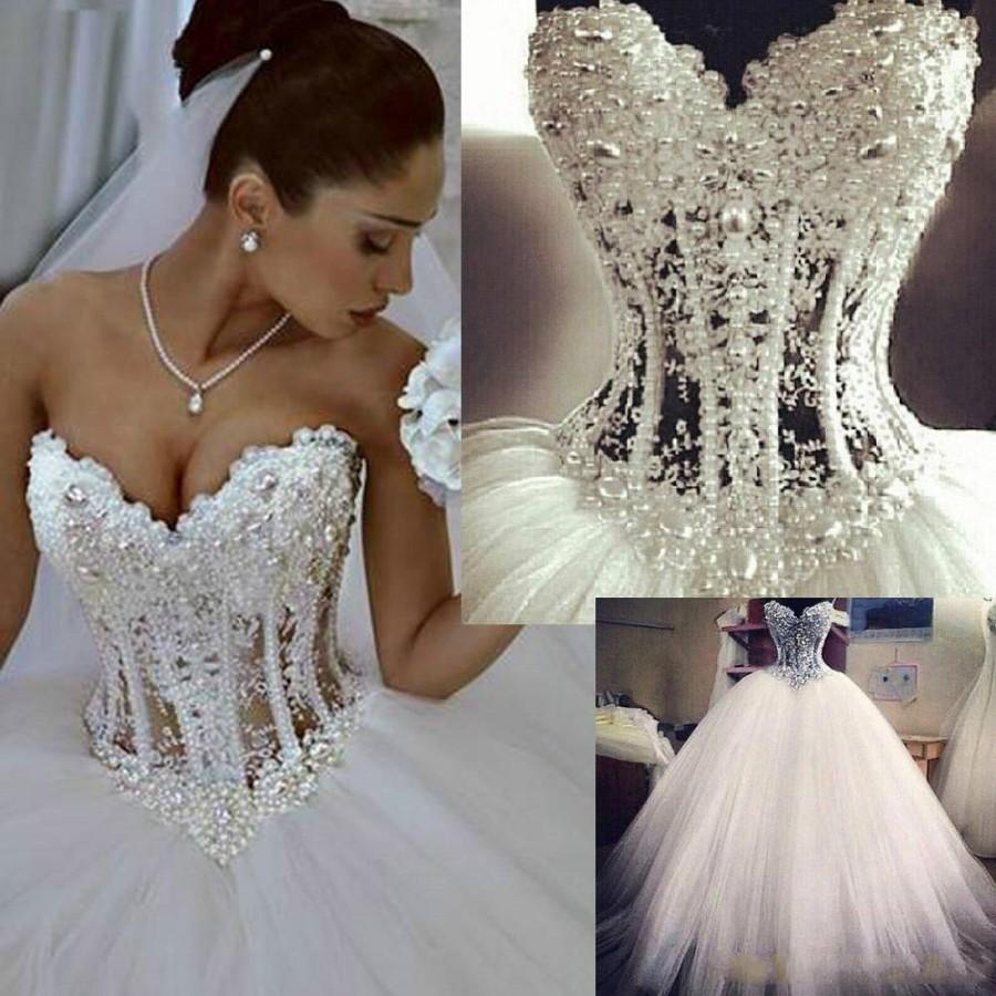 Hochzeit - Sexy 2015 Real Image Vestidos De Noiva White Strapless Romantic Wedding Dresses Ball Gown Pearls Beads Bridal Gown Lace Up Back Tulle Spring Online with $138.85/Piece on Hjklp88's Store 